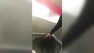 Black girl fucks white cock in club restroom