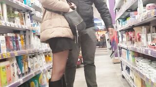 Girl in shiny black pantyhose and boots with her boyfriend