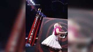 WWE - Alexa Bliss turning a crank at Wrestlemania 37