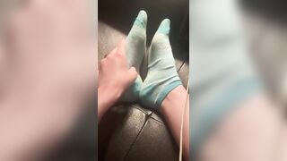 Rubbing Feet and taking off Socks