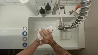 In-Home Massage Therapist Austin Wolf Washes Hands