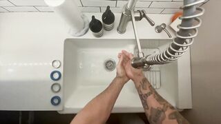 In-Home Massage Therapist Austin Wolf Washes Hands