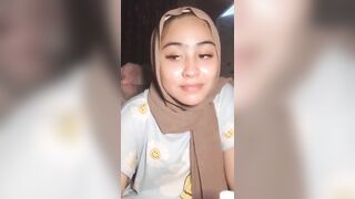 Hijab girl showing the boobs