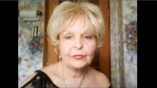 Elegant elderly lady shows herself on Skype