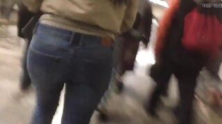 Ass in jeans, walking in metro