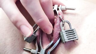 Metal Fetish Slut Clamps her Pussy with new Toy from Fan!!! *genital Piercings*