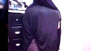 Arab girl with a big ass wearing a Niqab shows big boobs