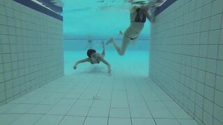 Teens have Fun under Water