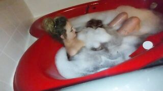 Dirty little slut takes a bubble bath in heart shaped tub and plays with feet ????????????