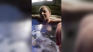 Orgasm in the hot tub playing with her pussy