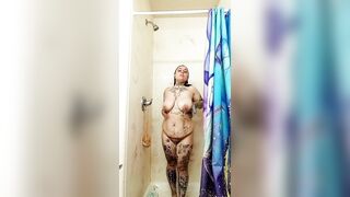 Wet tattooed MILF