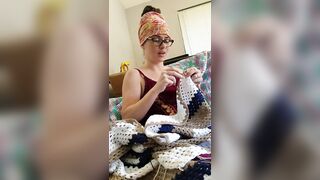 Creature crocheting and singing a tune