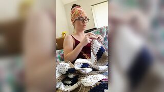 Creature crocheting and singing a tune