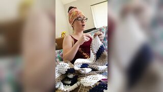 Creature crocheting and singing a tune