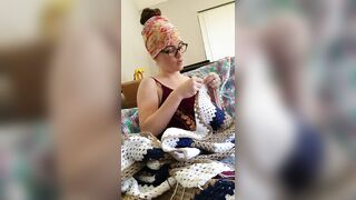 Creature crocheting and singing a tune