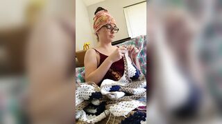 Creature crocheting and singing a tune