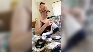 Creature crocheting and singing a tune