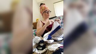 Creature crocheting and singing a tune