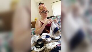 Creature crocheting and singing a tune