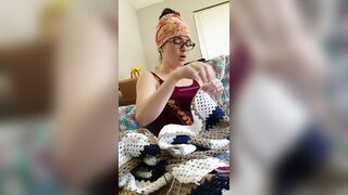 Creature crocheting and singing a tune