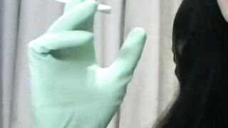 Smoking Wife in Green Rubber Gloves Handjob