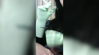 Smoking Wife in Green Rubber Gloves Handjob