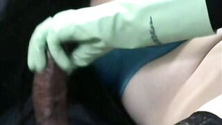 Smoking Wife in Green Rubber Gloves Handjob