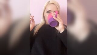 Sexy blonde girl smoke a cigarette