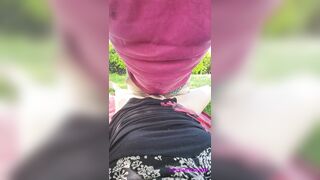 this slut pisses on his cock and gets cum on in a public garden