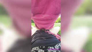 this slut pisses on his cock and gets cum on in a public garden