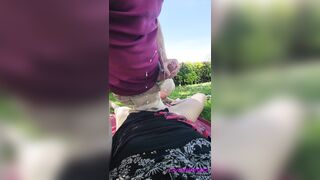 this slut pisses on his cock and gets cum on in a public garden