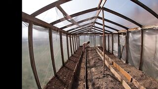 Nude house wife working in the greenhouse